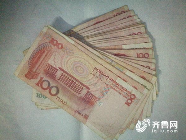 临沂一无聊孕妇赶集扒窃 现场缴获7部手机