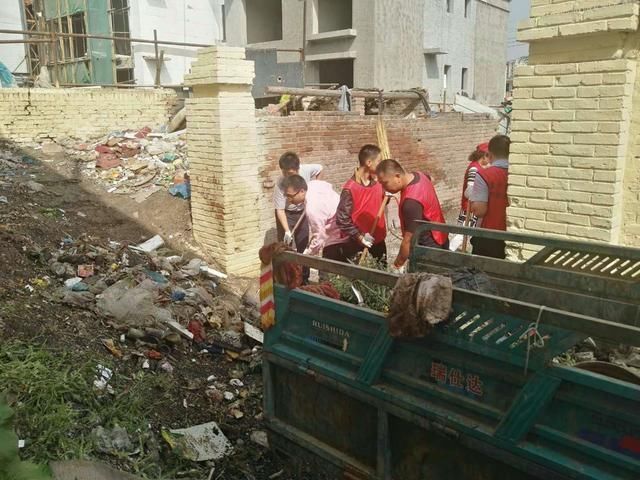 区:组织文明单位开展环境整治 助力三城同创