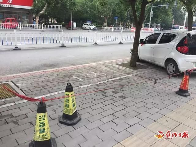 焦作城区公共停车位被个人占用收费!谁来管?官