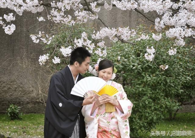 中国女游客到日本大阪看樱花,从早上开始园内