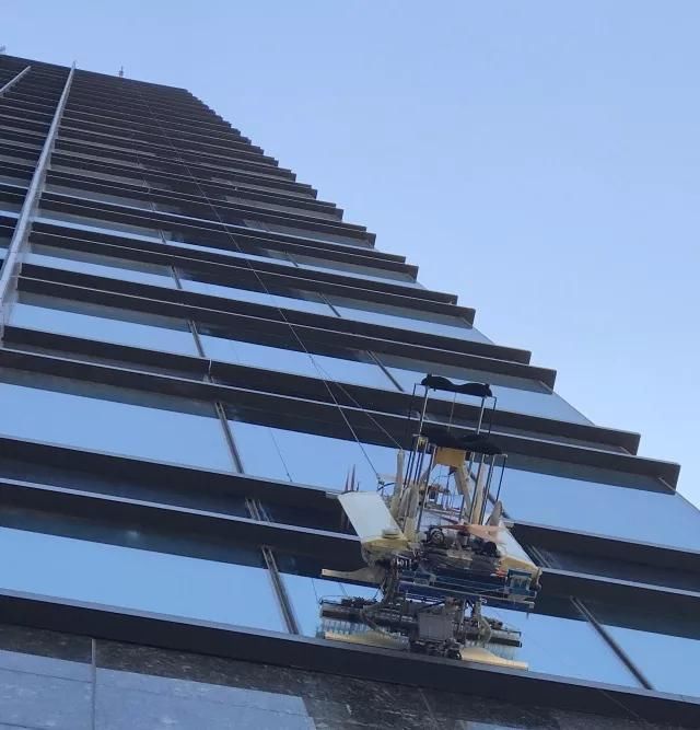 厦企造机器人上岗实习 洗高楼外墙又快又好