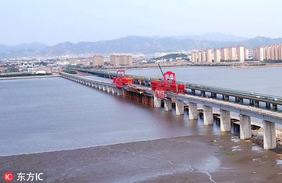 国内首座节段拼装双线跨海铁路大桥顺利合龙 青连铁路年底通车