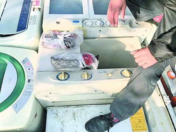 武汉一油漆工藏5.2万元积蓄的洗衣机被家人卖