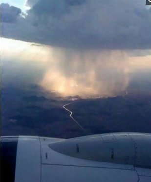 坐飞机遇上下雨才是你的福气，雨景实在太美了如梦似幻!